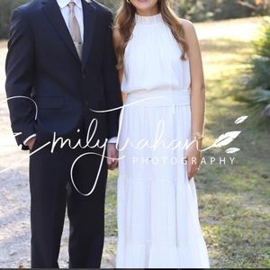 White maxi dress with bow in the back!